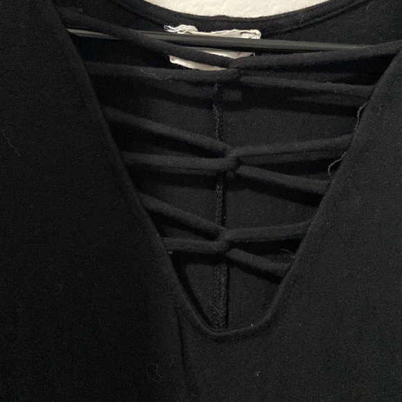 Medium women’s black blouse with ruffle sleeves and cross chest - Picture 2 of 3